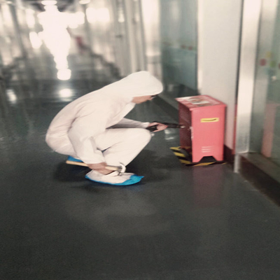 ชุดคลุมแบบใช้แล้วทิ้งแบบไม่ทอ
